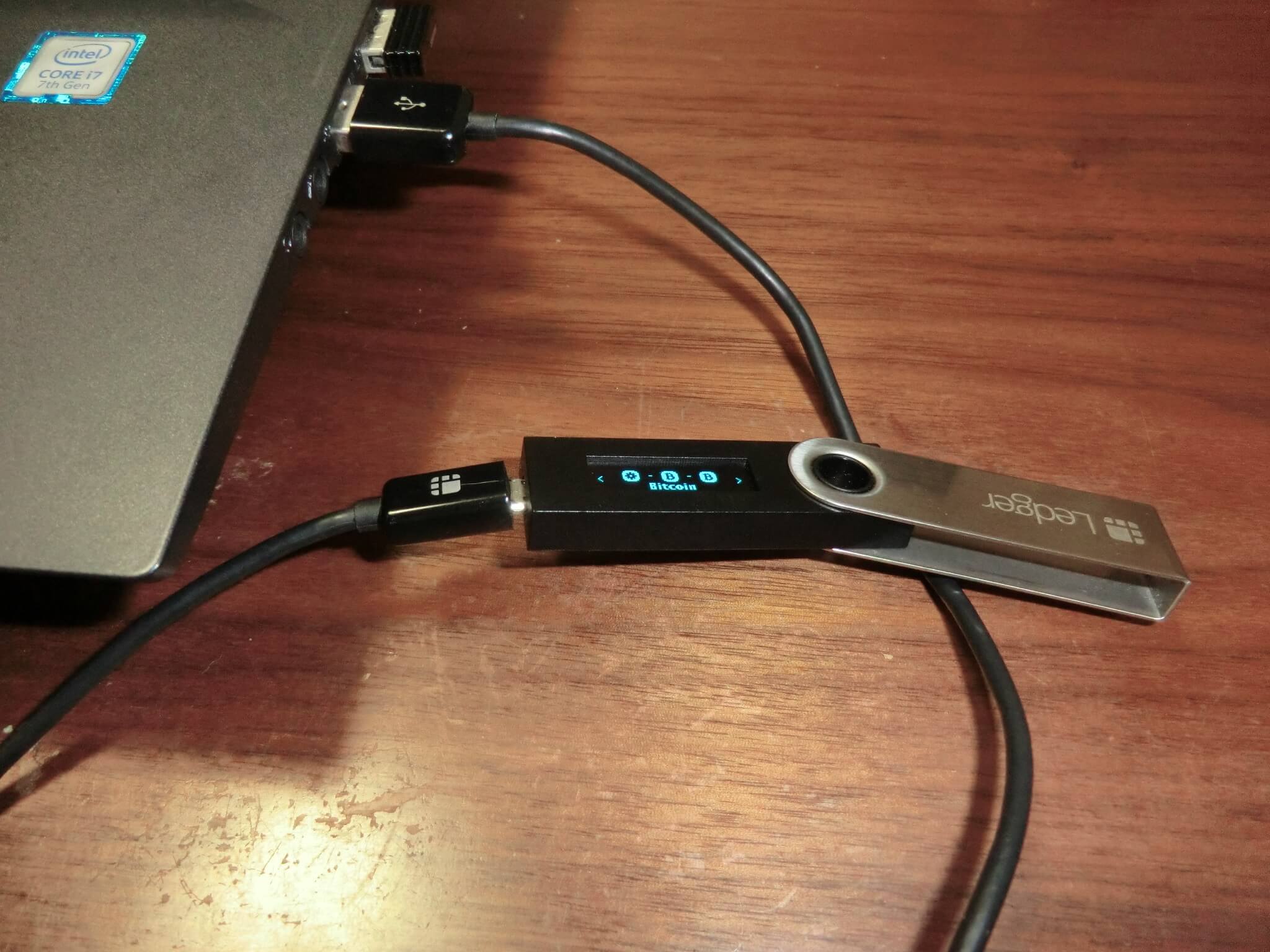 Ledger hardware wallet attached to a computer