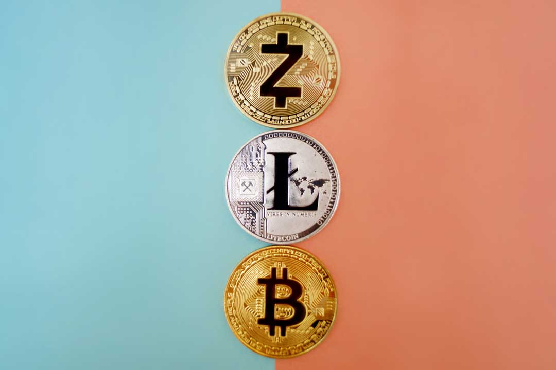 ZCash, Litecoin, and Bitcoin (BTC) are illustrated as physical coins