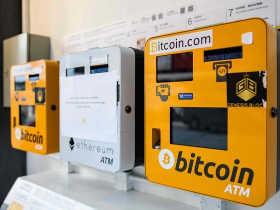 Two Bitcoin (BTC) ATM machines and an Ethereum (ETH) ATM machine