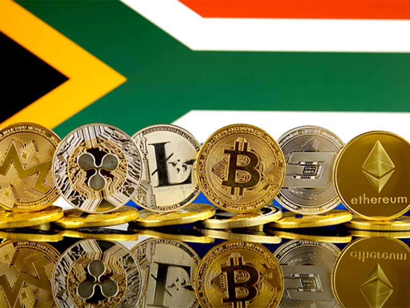 The illustration of various cryptocurrencies in front of national flag of South Africa