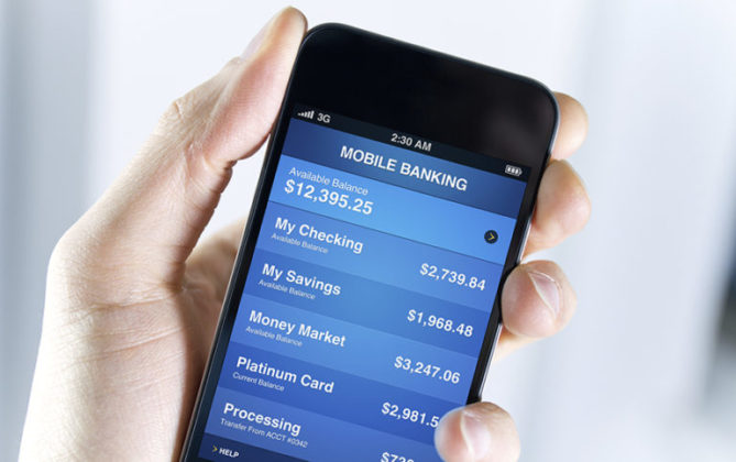 mobile banking with cryptocurrencies man holding smart phone 