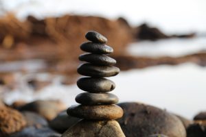 Photo of stones piled on top of each other to illustrate the topic of stablecoins za.
