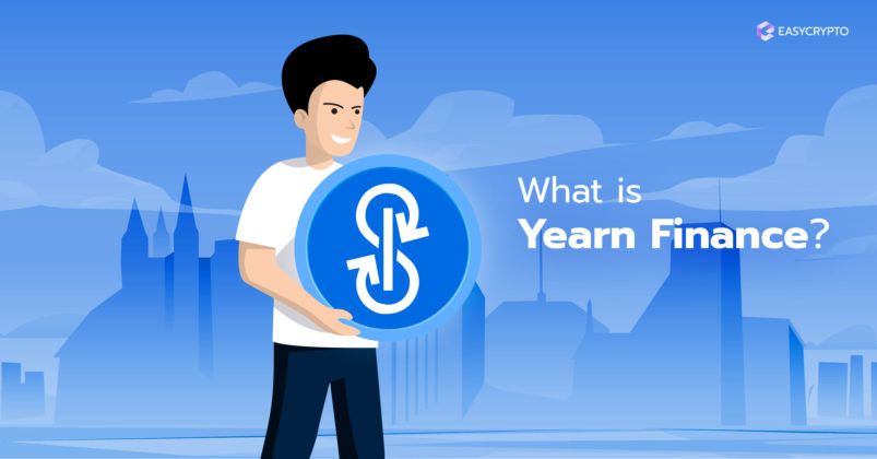 Guy holding the the Yearn Finance YFI logo on a blue background.