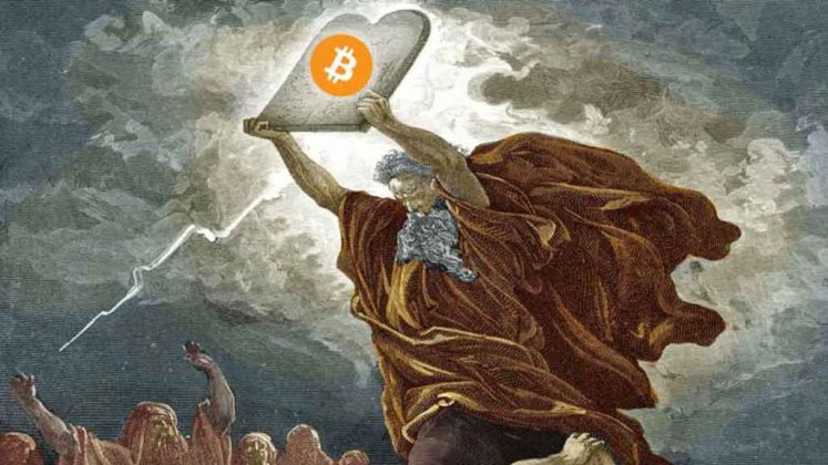 Holy man holding up a bitcoin slate