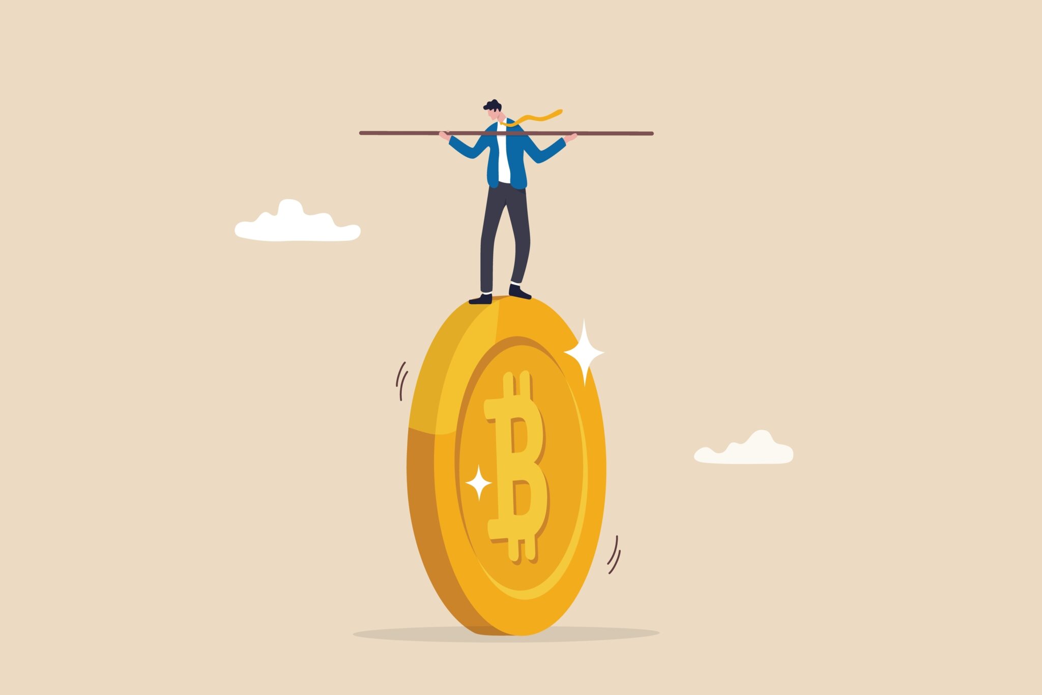 Image of a man balancing himself on top of a physical bitcoin.
