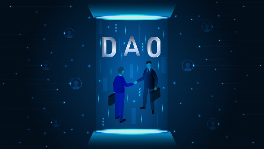 Graphic of two people shaking hands to illustrate decentralised autonomous organisation DAO